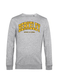 Felpa grigia con colletto a girocollo, caratterizzata dalla scritta "BERKELEY" in grassetto giallo sopra la dicitura "UNIVERSITY OF CALIFORNIA". Tessuto morbido e maniche lunghe.