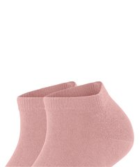 Calzini alla caviglia rosa realizzati in una miscela di cotone, caratterizzati da una texture a coste, colore uniforme e una vestibilità aderente attorno alle caviglie, senza motivi o loghi visibili.