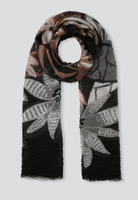 Écharpe aux motifs floraux colorés mêlant gris, noir et tons doux, confectionnée en tissu léger et texturé avec des bords à franges.