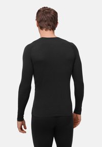 Schwarzes Langarm-Thermoshirt mit glatter Textur, rundem Halsausschnitt und Raglanärmeln, körperbetont geschnitten für Wärme und Komfort.