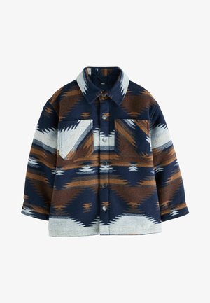 Veste en laine à manches, présentant un design géométrique abstrait dans des tons de marine, marron et gris, dotée d'un col et de deux poches poitrine.