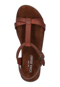 Vanskal brown i læder med en polstret suede indersål, der har tynde stropper og en sidelukning med spænde for justerbar pasform.