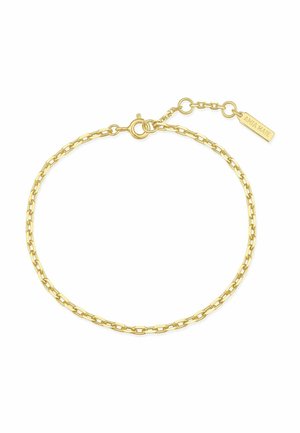 Bracelet en chaîne dorée avec des maillons allongés, doté d'un fermoir mousqueton et d'une étiquette attachée gravée "Ania Haie."