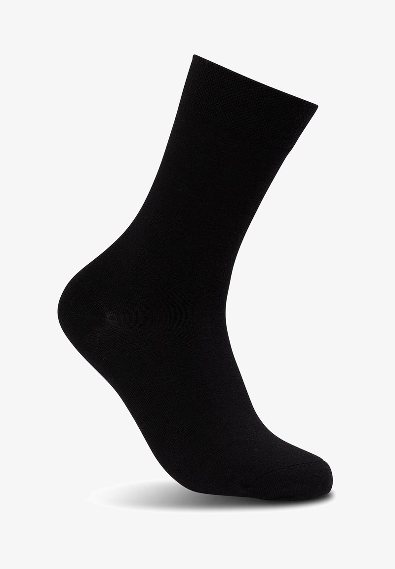 Calcetín negro hasta la rodilla hecho de una tela suave. Presenta un puño acanalado en la parte superior y una puntera reforzada para mayor durabilidad. Diseño clásico.