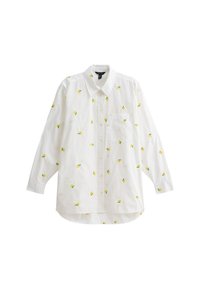 Chemise blanche à manches longues avec broderie de citron jaune, bouton devant, col et poche poitrine unique. Tissu en coton doux.