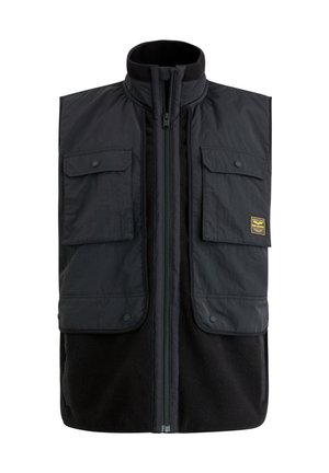 Black vest featuring a zippered front, two chest pockets with flaps, and a fleece lining for warmth. Made of durable fabric with a smooth texture.