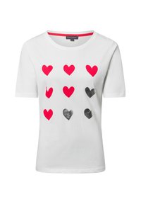 White cotton t-shirt featuring a grid of red and black heart shapes on the front, with a round neck and short sleeves.