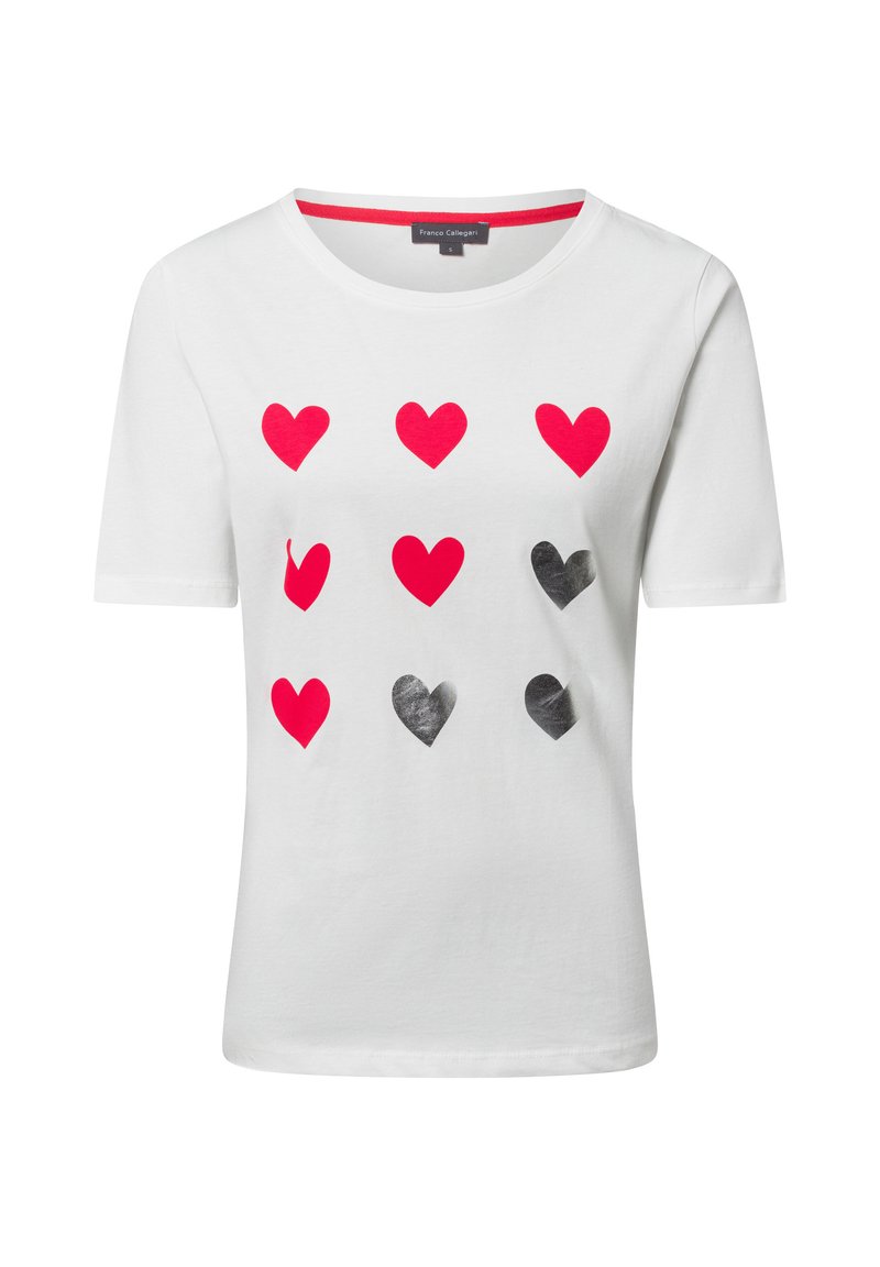 White cotton t-shirt featuring a grid of red and black heart shapes on the front, with a round neck and short sleeves.