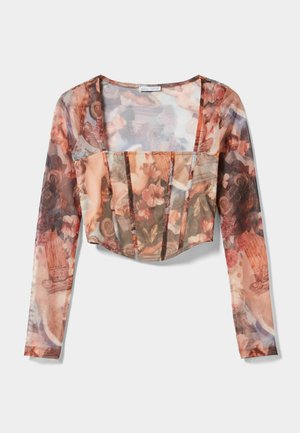 Top corto transparente de manga larga con escote cuadrado y estampados de flores y columnas clásicas en tonos cálidos.