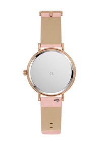 Montre ronde avec un cadran argenté réfléchissant, un boîtier en or rose et un bracelet en silicone rose et beige. Comprend une couronne latérale et une boucle ajustable.
