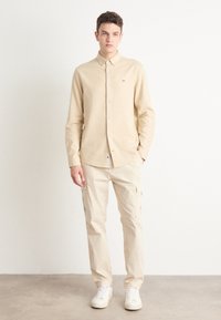 Tommy Jeans SHIRT - Shirt - newsprint