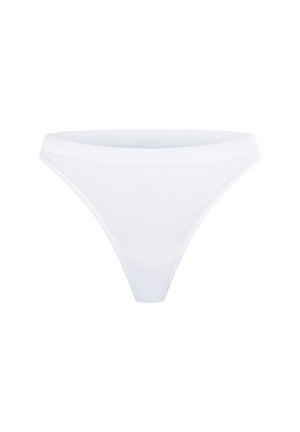 String blanc en coton avec un design lisse et sans coutures, et une taille basse. Le tissu semble doux et flexible, convenant pour un usage quotidien.