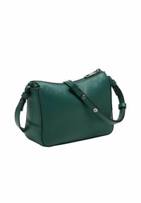 Zielona skórzana torba na ramię o gładkiej fakturze, zamykana na zamek błyskawiczny, z regulowanym paskiem. Okrągły kształt z subtelnym przeszyciem.
