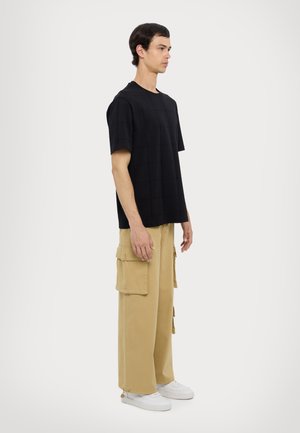 Armani Exchange Nyomott mintás póló - black