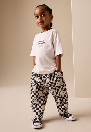 Next, REGULAR FIT - BARREL PULL ON TROUSERS  . - Pantalon classique - black neutral happy face checkerboard