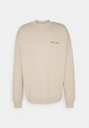 Beige sweatshirt with a crew neckline, long sleeves, and ribbed cuffs. Features two black "SAM SøE" logos on the chest. Soft fabric texture.