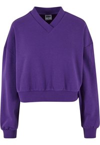 Fialový skrátený sweatshirt s výstrihom do V a dlhými rukávmi. Vyrobený z hladkej textílie s nariaseným lemom a rebrovanými manžetami.