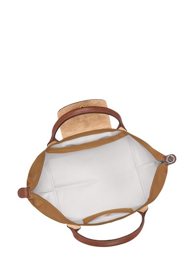 Brown leather tote bag with textured handles, open top, featuring a beige fabric interior and a zippered pocket inside.