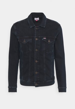 Veste en jean noire avec fermeture par boutons, deux poches poitrine à rabats, manches longues et petit logo Tommy Jeans sur la poche poitrine.