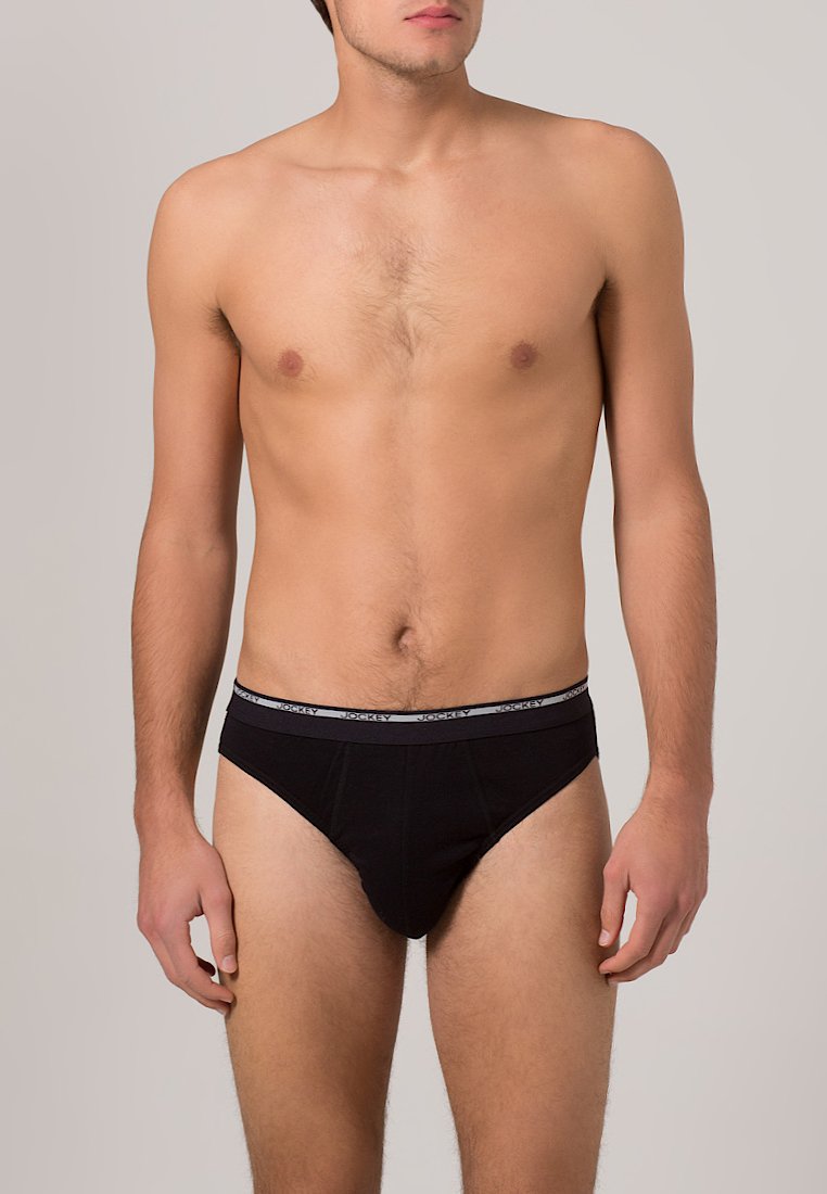 Schwarze Baumwollslips mit taillierter Passform und elastischem Bündchen, das ein graues Jockey-Logo trägt. Glatte Textur und minimalistischer Stil.