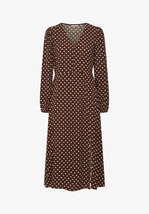 Braunes Polka-Dot-Kleid mit langen Ärmeln, einem V-Ausschnitt und einem seitlichen Schlitz, gefertigt aus einem weichen Stoff, der sanft fällt.