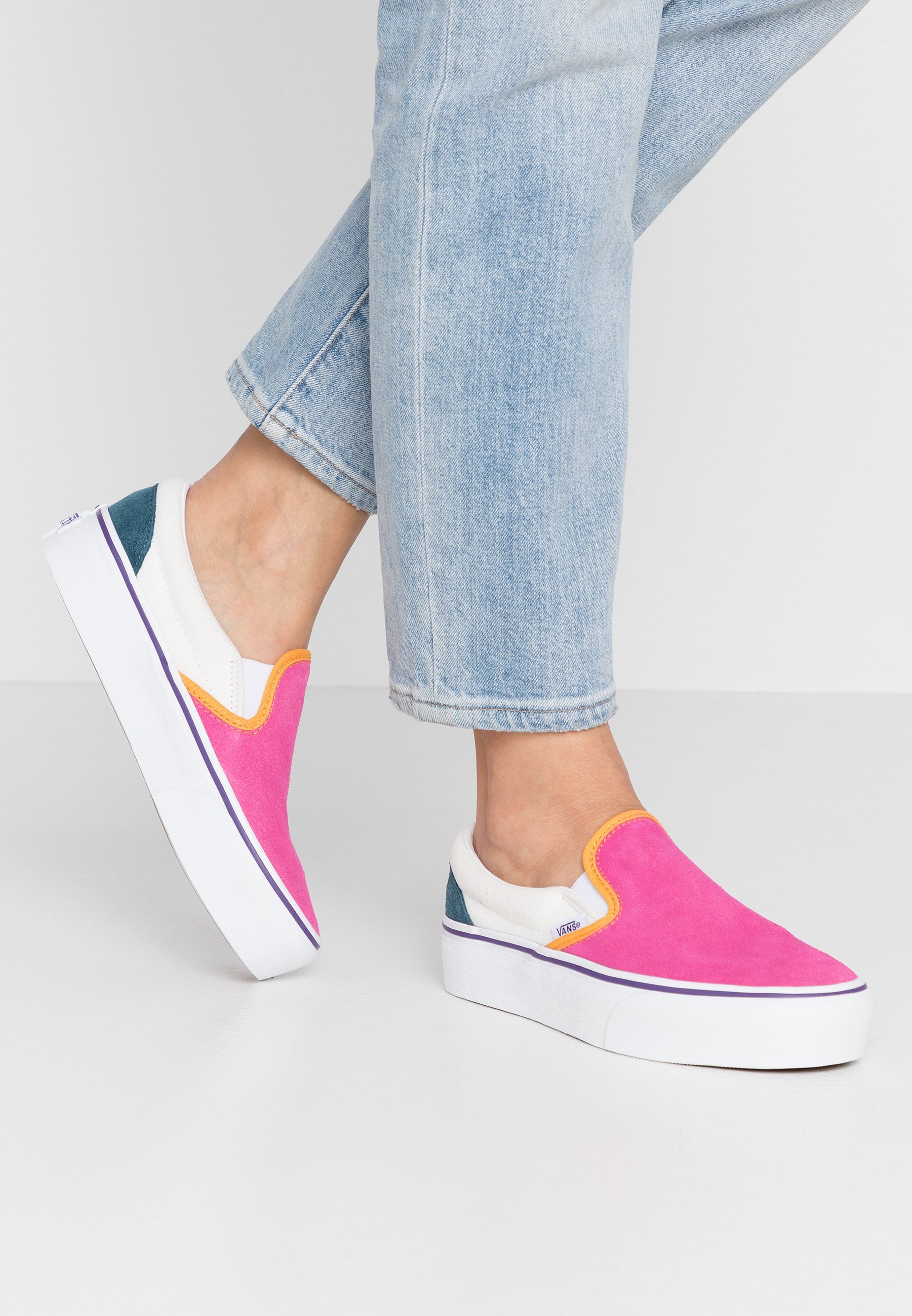 vans multicolor slip ons