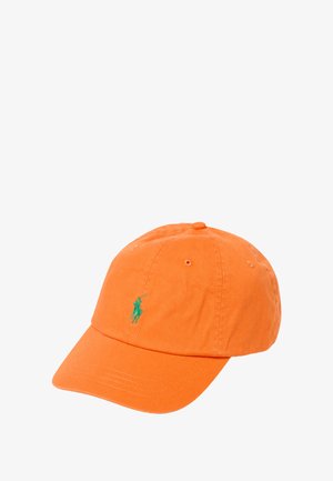 Oranje katoenen baseballpet met een groen geborduurd logo. Beschikt over een gebogen klep en zes ventilatie-oogjes. Zachte, gestructureerde stof.