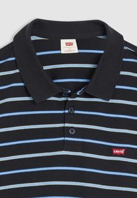 Black polo shirt with horizontal blue and yellow stripes, featuring a classic collar, two-button placket, and a small red Levi's logo.