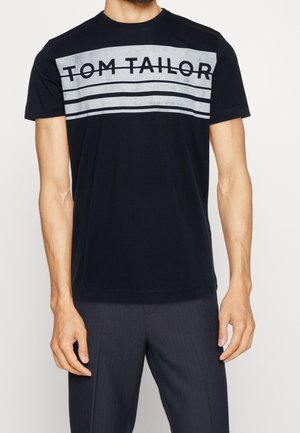 Zwarte katoenen t-shirt met een grijze horizontale streep en het "TOM TAILOR" logo, ronde hals, korte mouwen en een ontspannen pasvorm.