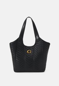 Black quilted tote bag with a chevron pattern, featuring two top handles and a gold logo accent. Smooth leather texture throughout.