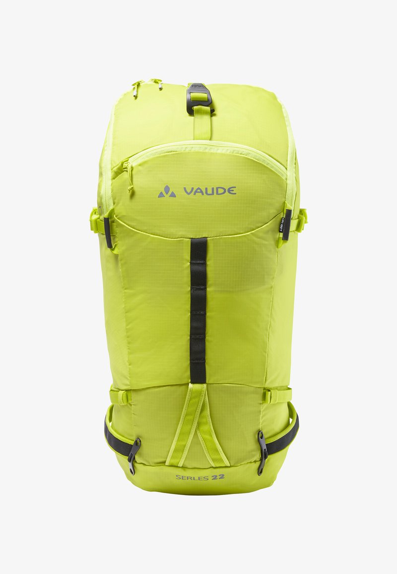 Sac à dos Vaude vert lime de forme rectangulaire, avec une poignée supérieure, des bretelles ajustables, des sangles de compression latérales et un logo sur le panneau avant.