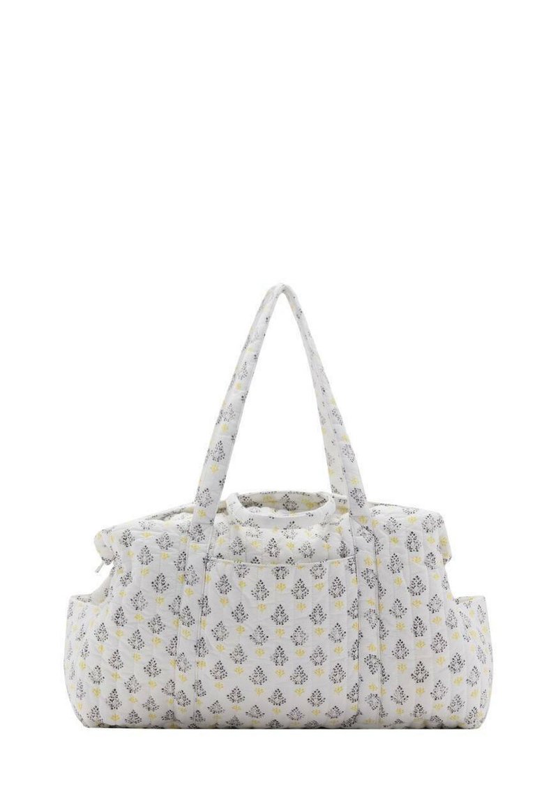 Quiltad sportväska med vit bas, mönstrad med grå och gula blommönster, med två handtag och ett rymligt fack.