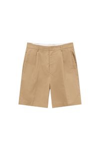 Bermudas de algodón beige con un diseño ajustado, que presentan plisados y bolsillos laterales. Textura suave y un corte estructurado.