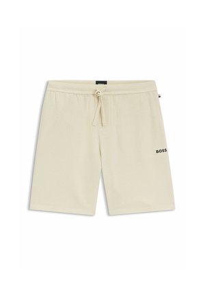 Short beige en tissu texturé avec une taille ajustable à cordon et le logo "BOSS" sur la cuisse gauche.