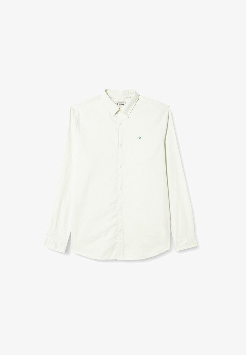 Lange mouwen knoopshirt van off-white stof, met een groen logo op de borst, klassieke kraag en knoopsluiting aan de voorkant.