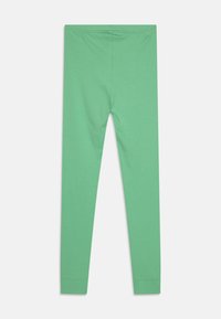 Leggings verts en matériau texturé et extensible avec un design ajusté. Comprend une taille sans couture et des jambes longues.