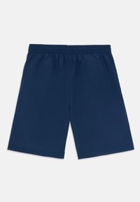 Calções azul-marinho com cintura elástica, de corte solto, vistos de frente, sobre um fundo branco.