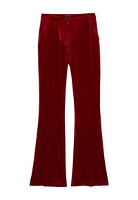 Red velvet flared pants featuring a smooth texture, two front pockets, belt loops, and a button closure at the waistband.