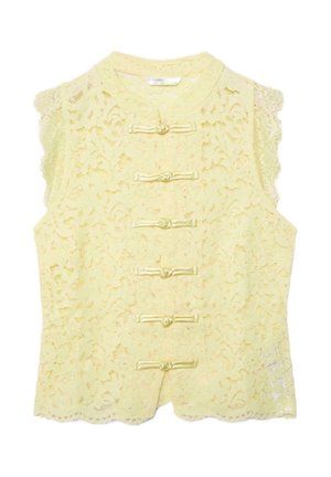 Blouse sans manches en dentelle jaune pâle avec col rond et six boutons nœuds en satin horizontaux sur le devant.