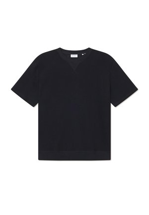 Svart kortärmad t-shirt i texturerat material, med rund halsringning och rak fåll. Inga synliga mönster eller detaljer.