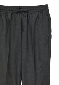 Pantalons gris charbon avec un motif en chevrons, taille élastique et cordon de serrage. Poche sur le côté droit, coupe décontractée.