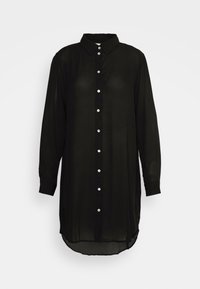 Abito camicia nero a maniche lunghe con bottoni, colletto, bottoni bianchi lungo il centro e orlo curvo su sfondo neutro.