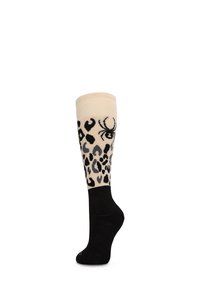 Medias hasta la rodilla con una parte superior color crema con estampado de leopardo negro y un diseño de araña, que transiciona a una sección de pie negra.