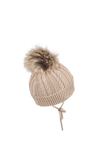 Knitted beige hat with a cable pattern, a faux fur pom-pom on top, and string ties for secure fitting. Textured and warm design.