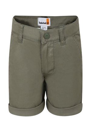 Shorts chino vert olive avec ourlets roulés, fermeture à bouton et couture renforcée. L'étiquette affiche des informations sur la marque et la taille.