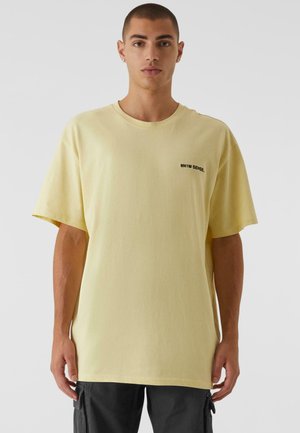 ESSENTIALS - T-Shirt print - softyellow