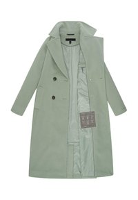 Manteau long en laine vert clair à double boutonnage, col large, deux boutons, poches latérales et doublure intérieure lisse avec étiquette à l’intérieur.