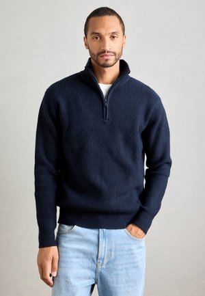 - Sweter
