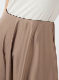 Brown satin skirt with a smooth texture, featuring a fitted waistband, black trim, and a flowy silhouette.
