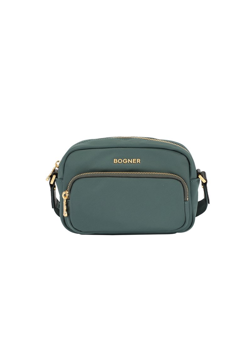 Grön nylon crossoverväska med guldfärgade dragkedjor, har en framficka och justerbar rem. BOGNER-logotypen tryckt fram. 